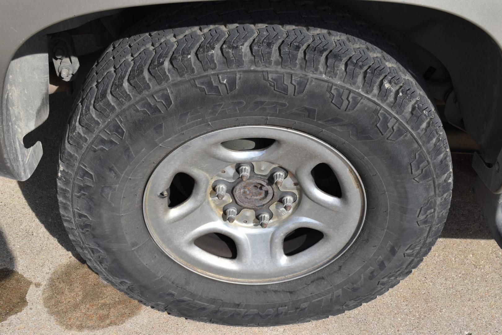 2003 Gold /Tan Chevrolet Suburban (1GNEC16Z23J) with an V8, 5.3.0L engine, 4 SPEED AUTOMATIC transmission, located at 5925 E. BELKNAP ST., HALTOM CITY, TX, 76117, (817) 834-4222, 32.803799, -97.259003 - Buying a 2003 Chevrolet Suburban can offer several benefits, including: Spaciousness: The Suburban is known for its ample interior space, making it great for large families, hauling cargo, or even converting into a camper. Towing Capacity: It's equipped with a robust engine and frame, allowing it - Photo#25